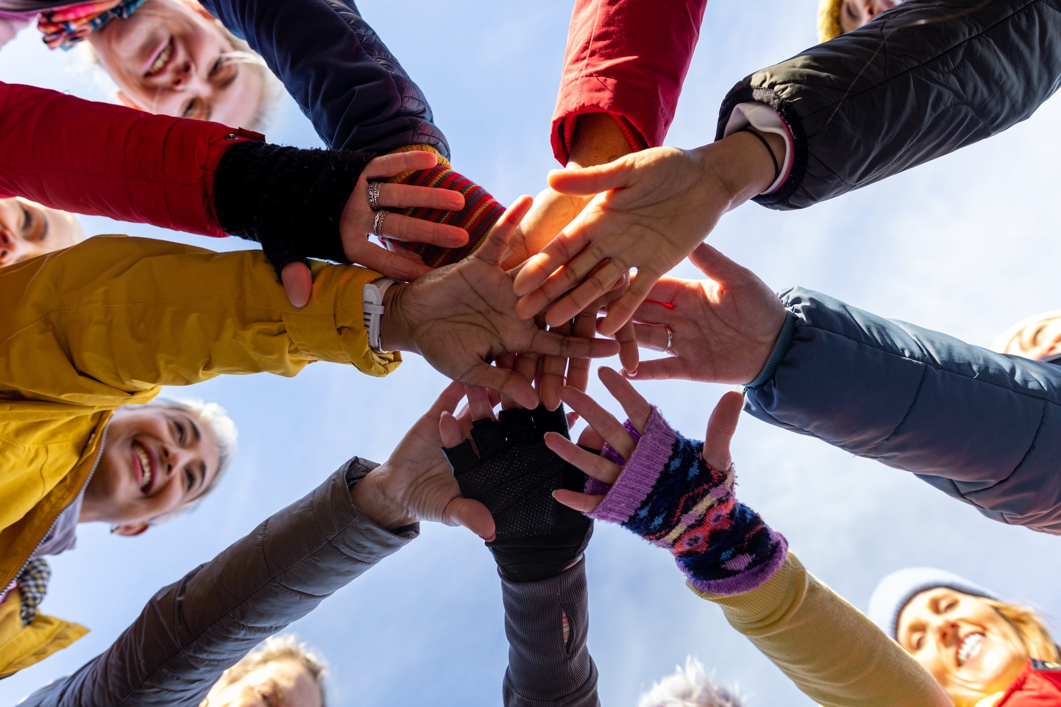 Hands joined together in a circle.