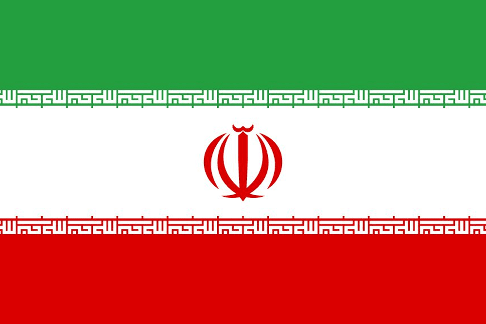 Flag of Iran with emblem and script.