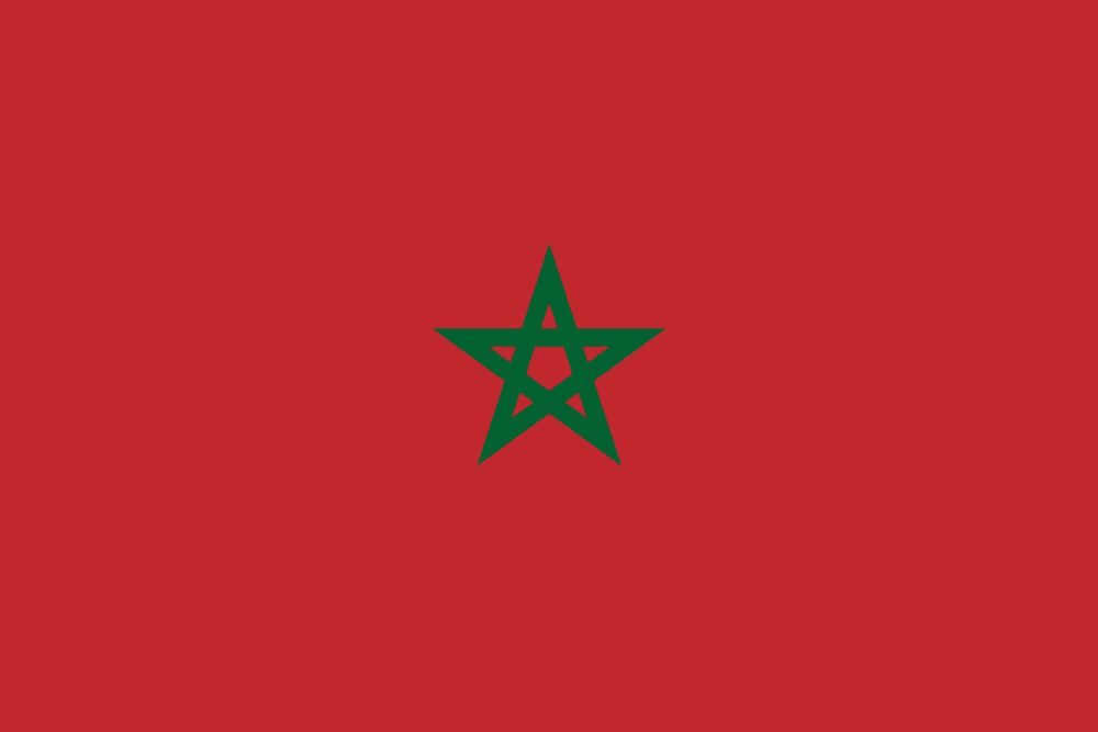 Flag of Morocco with green star.