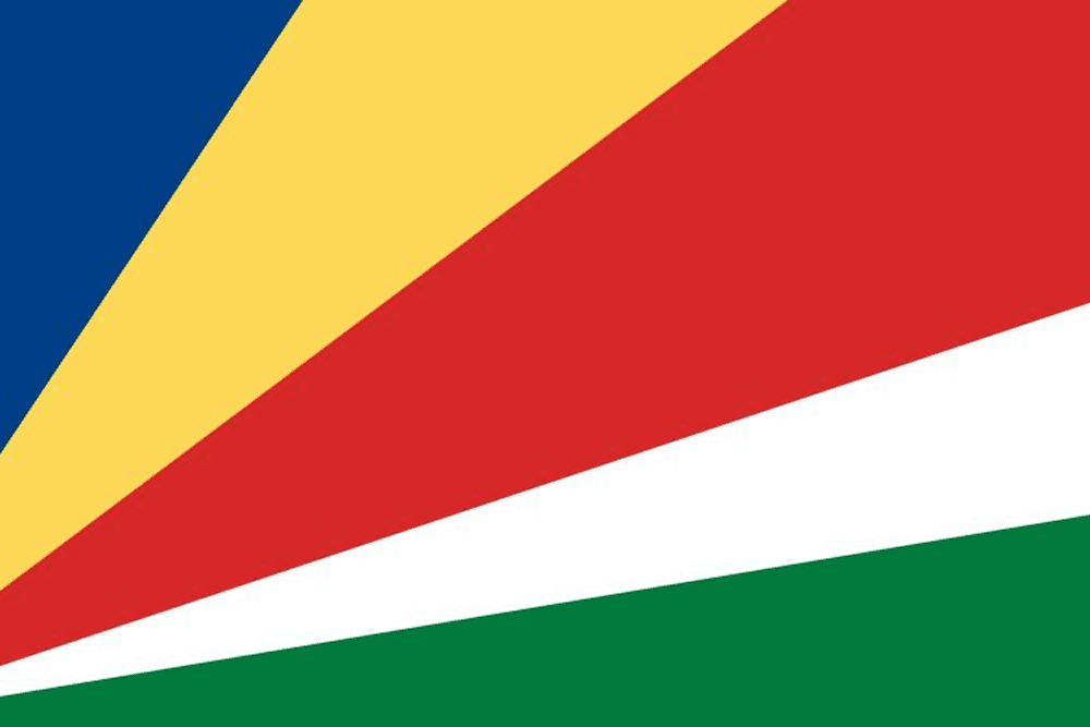 Flag of Seychelles with colorful diagonal stripes.